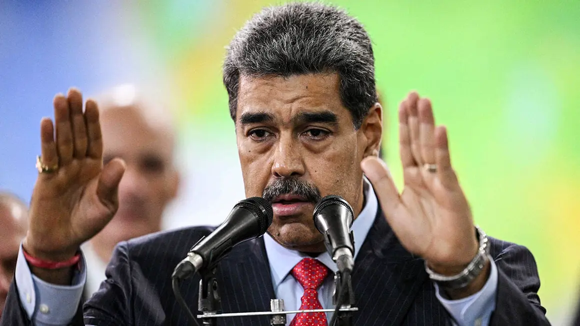 <p>El presidente venezolano Nicolás Maduro pronuncia un discurso tras su visita al Tribunal Supremo de Justicia de Venezuela en Caracas el 31 de julio de 2024 - AFP/FEDERICO PARRA</p>