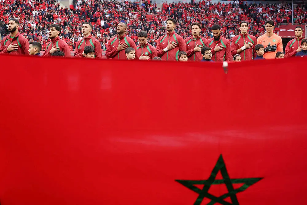 <p paraid="120566499" paraeid="{dd27e5a7-7db7-4316-aa3b-9c05ff82f5d2}{234}">Los jugadores de Marruecos se alinean antes del partido - REUTERS/ AMR&nbsp;ABDALLAH</p>
