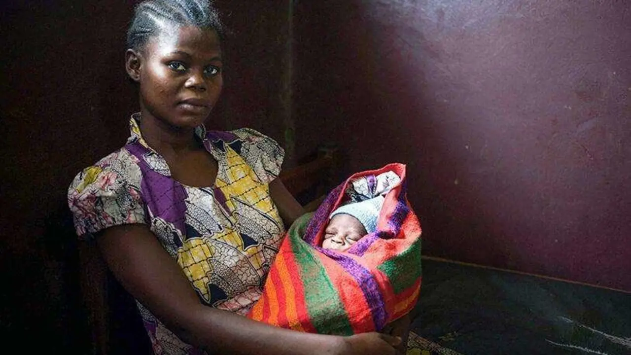 AFP PHOTO/FLORENT VERGNES - Mujer africana