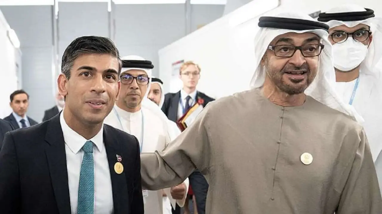 PHOTO/FILE - Rishi Sunak y Mohamed bin Zayed