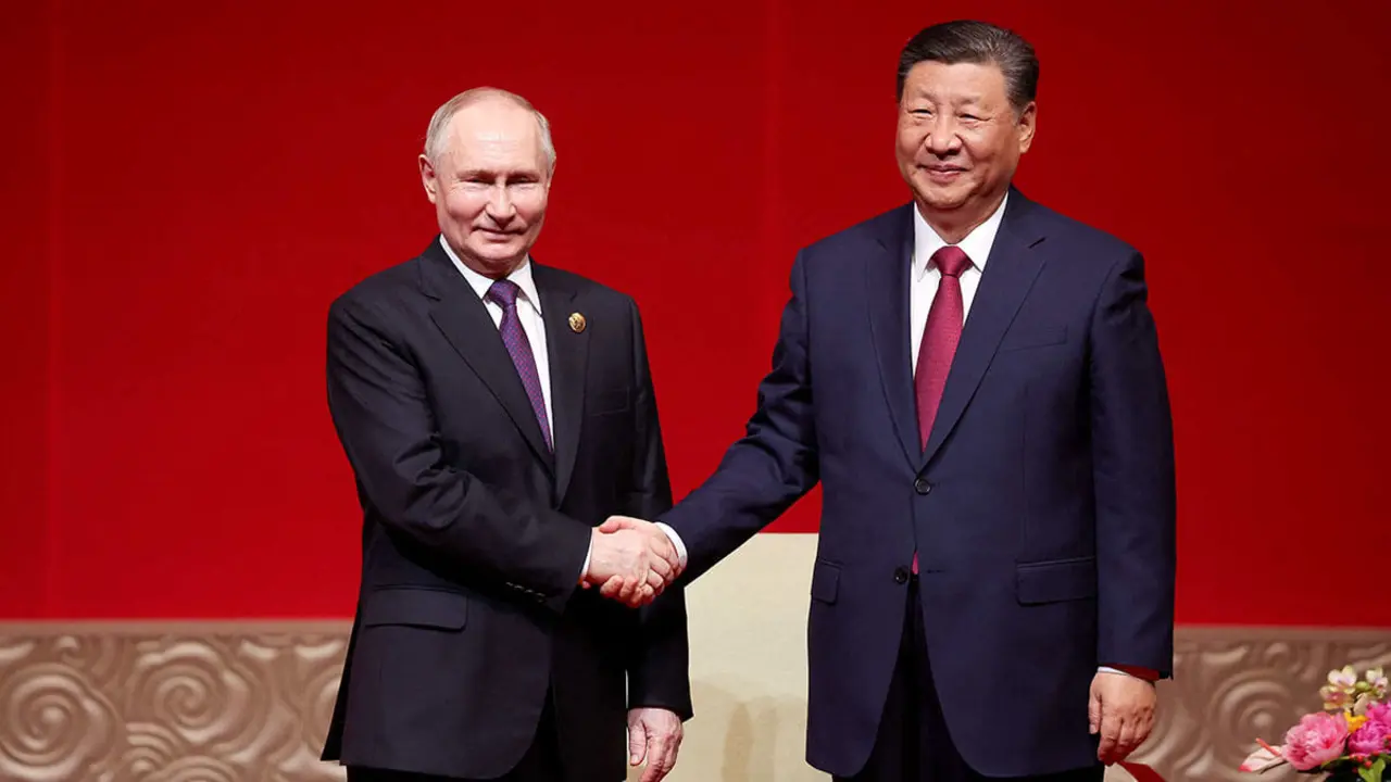 El presidente de Rusia, Vladimir Putin, y el presidente de China, Xi Jinping - AFP/ALEXANDER RYUMIN