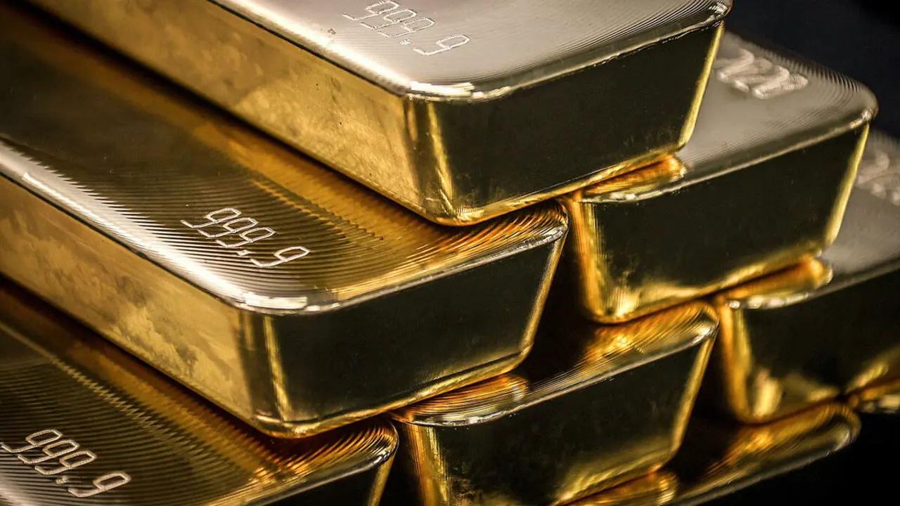 AFP/ DAVID GRAY - Lingotes de oro de 400 onzas troy, utilizados por los bancos para sus reservas