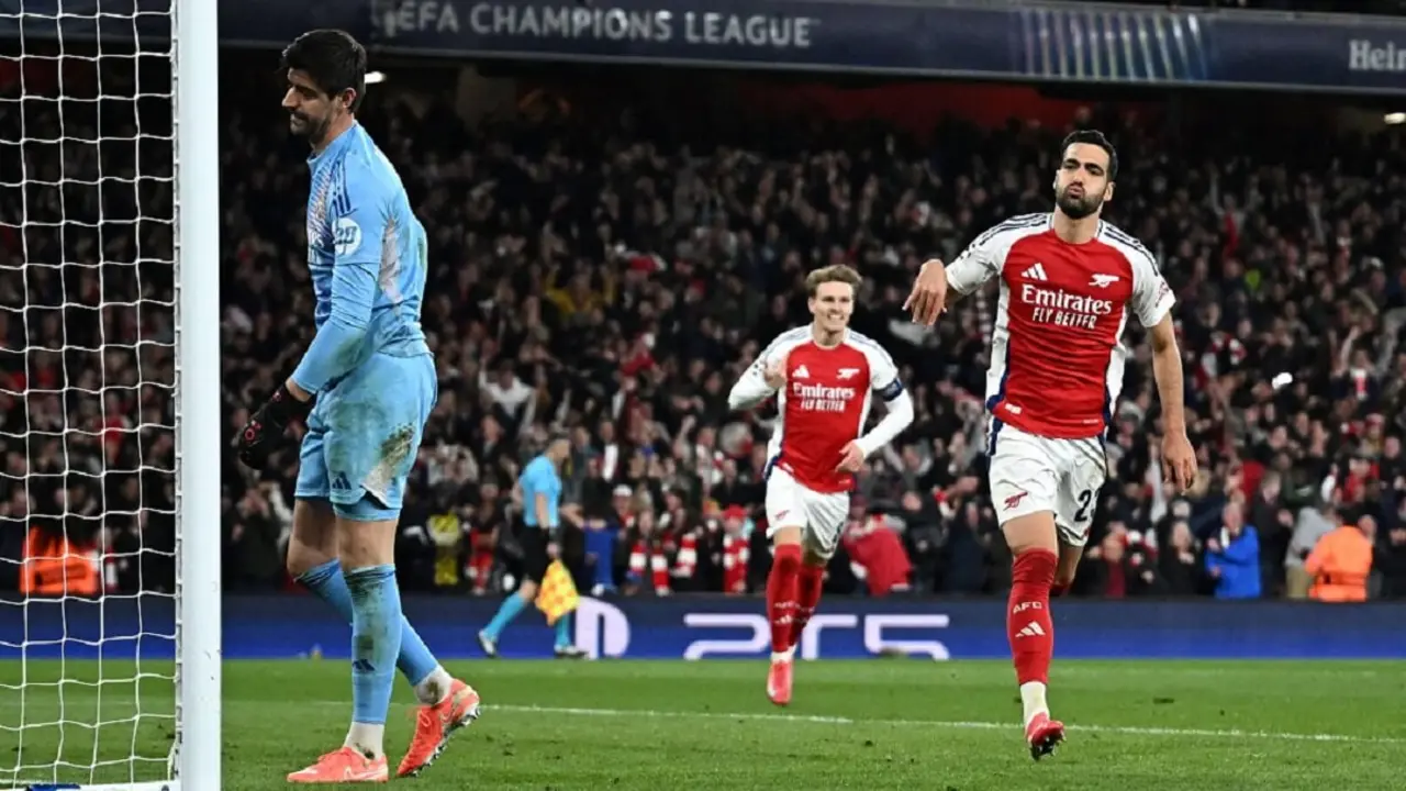 Thibaut Courtois, Martin Odegaard y Mikel Merino en el partido entre el Arsenal y el Real Madrid de Champions League - PHOTO/REUTERS/DYLAN MARTÍNEZ