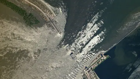 PHOTO/REUTERS -A satellite image shows damaged Nova kakhovka dam, amid Russias attack on  Ukraine, in Kherson region, Ukraine June 6, 2023