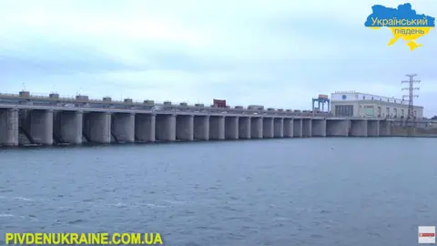 PHOTO/COURTESY OF UKRAYINSKYI PIVDEN/ via REUTERS – A view shows the Kakhovka Dam, in Nova Kakhovka, in this undated still frame taken from a social media video
