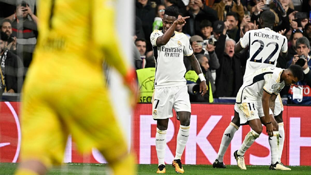 Vinicius Junior celebra el primer gol durante el partido entre el Real Madrid CF y el RB Leipzig en el estadio Santiago Bernabéu de Madrid el 6 de marzo de 2024 – PHOTO/JAVIER SORIANO/AFP