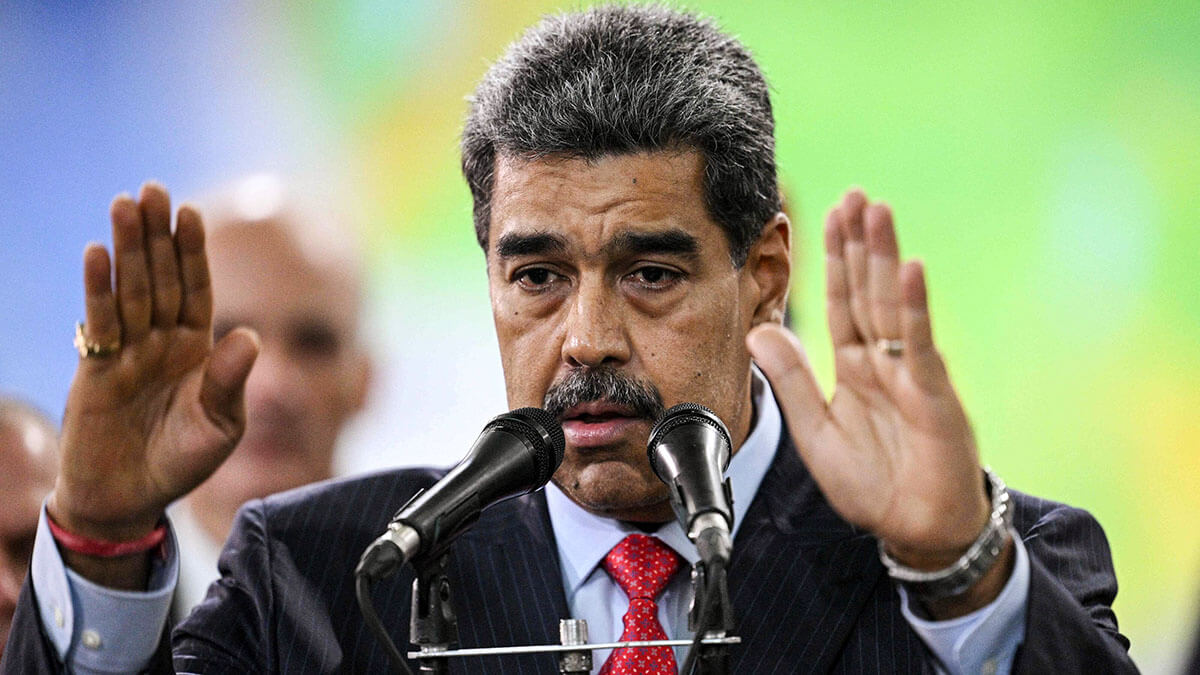 <p>El presidente venezolano Nicolás Maduro pronuncia un discurso tras su visita al Tribunal Supremo de Justicia de Venezuela en Caracas el 31 de julio de 2024 - AFP/FDERICO PARRA</p>