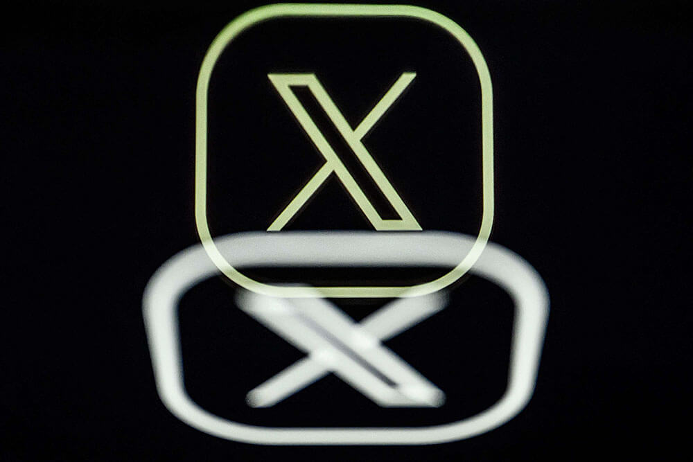 Logotipo de la plataforma de redes sociales estadounidense X, anteriormente conocida como Twitter - AFP/ LOIC VENANCE