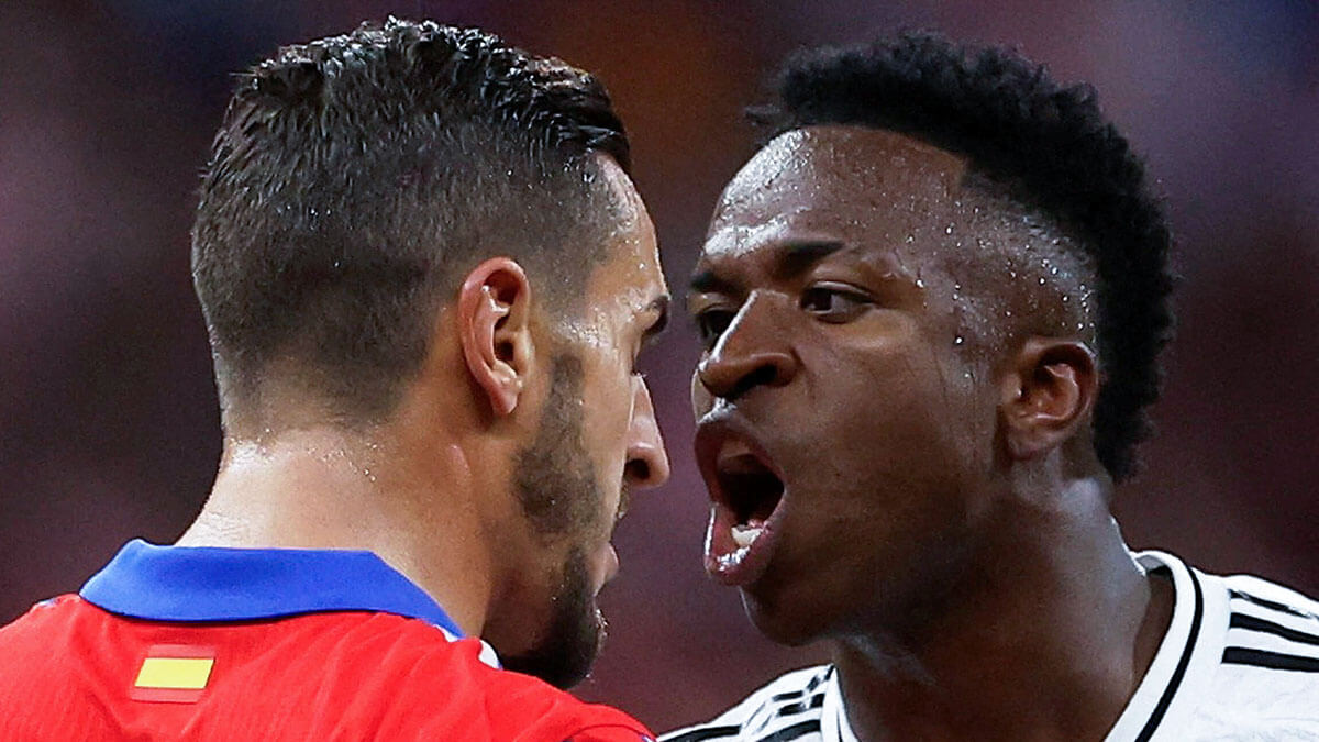 <p>Koke del Atlético de Madrid y Vinicius Junior del Real Madrid se enfrentan - REUTERS/JUAN MEDINA </p>