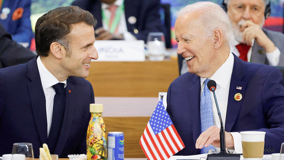 <p>El presidente de Estados Unidos, Joe Biden, junto al presidente de Francia, Emmanuel Macron, durante el primer día de la Cumbre del G20 en Río de Janeiro, Brasil, el 18 de noviembre de 2024 - AFP/ LUDOVIC MARIN </p>