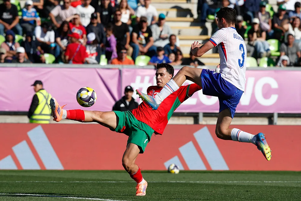 Othmane Maamma en acción con Frances Justin Bourgault - REUTERS/ RODRIGO GARRIDO