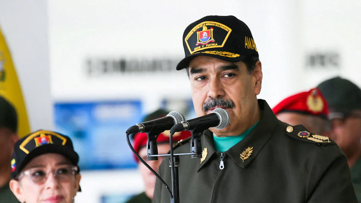 <p paraid="2108846024" paraeid="{ba58127e-168e-47ef-ba74-06ea3747141b}{75}">El presidente de Venezuela, Nicolás Maduro, y su esposa, Cilia Flores, asisten a una ceremonia de fin de año con las fuerzas militares en La Guaira, Venezuela, el 28 de diciembre de 2025 - PHOTO/ Palacio de Miraflores vía REUTERS </p>
