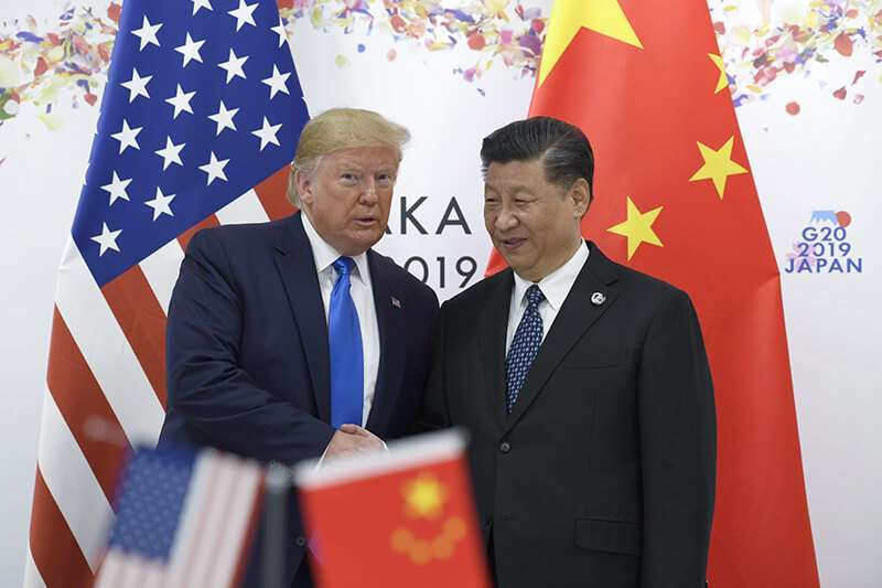 El presidente Donald Trump junto al presidente chino Xi Jinping durante una reunión al margen de la cumbre del G-20 en Osaka, Japón, el sábado 29 de junio de 2019